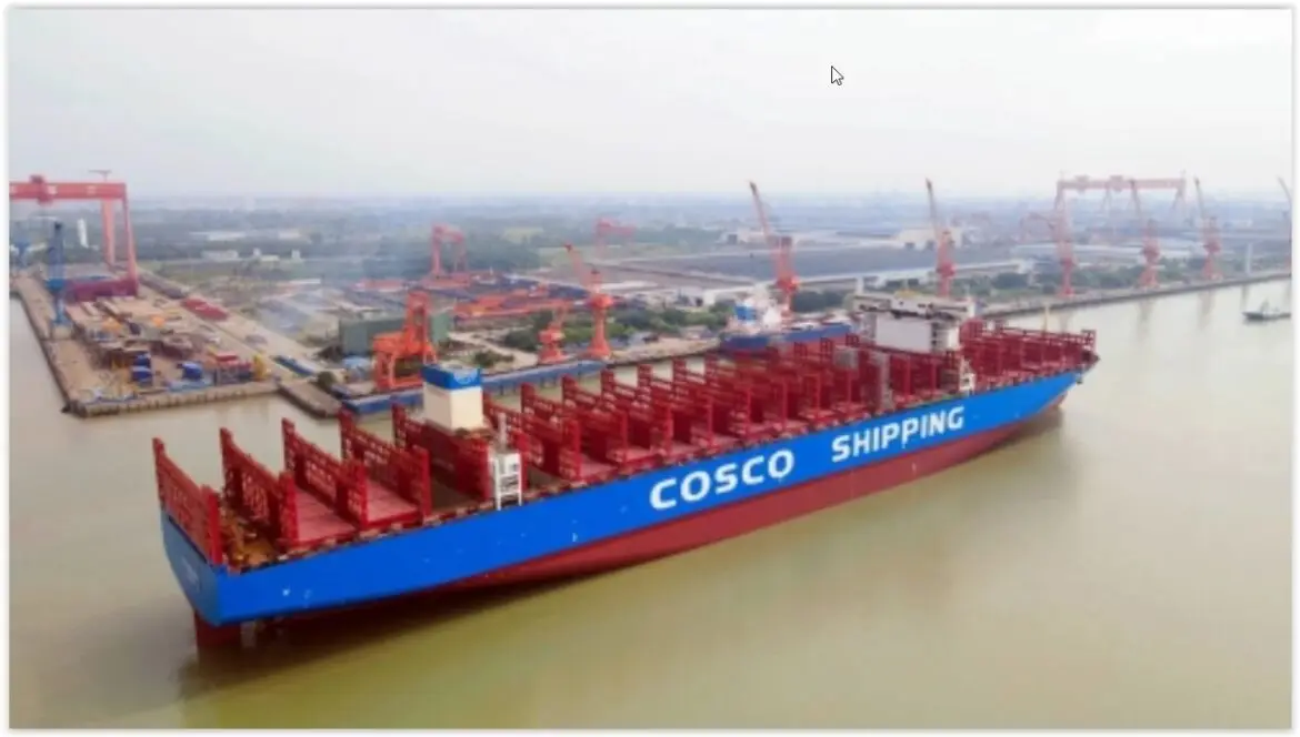 Modern methanol containership navigating calm waters.