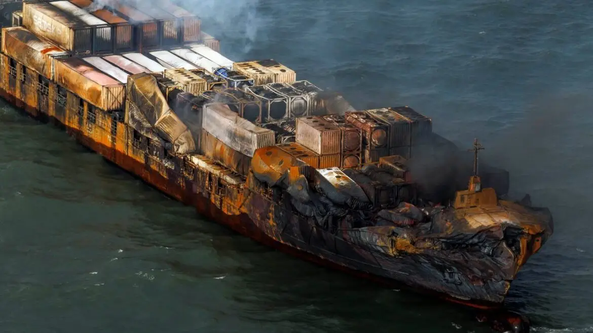 Arrested captain beside ship amid crashing dark North Sea waves.